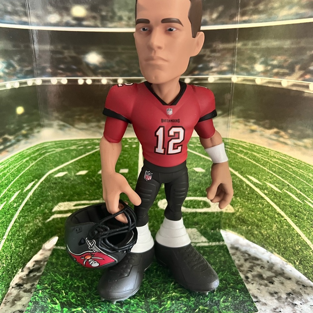 Red and Black Football Player Figurine